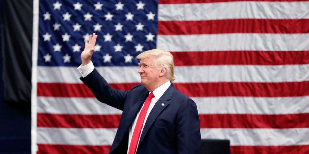 Republican presidential candidate Donald Trump arrives to speak at a campaign rally in Akron, Ohio, Monday, Aug. 22, 2016. (AP Photo/Gerald Herbert)