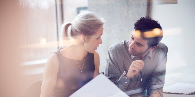 Man and woman in office having a meeting