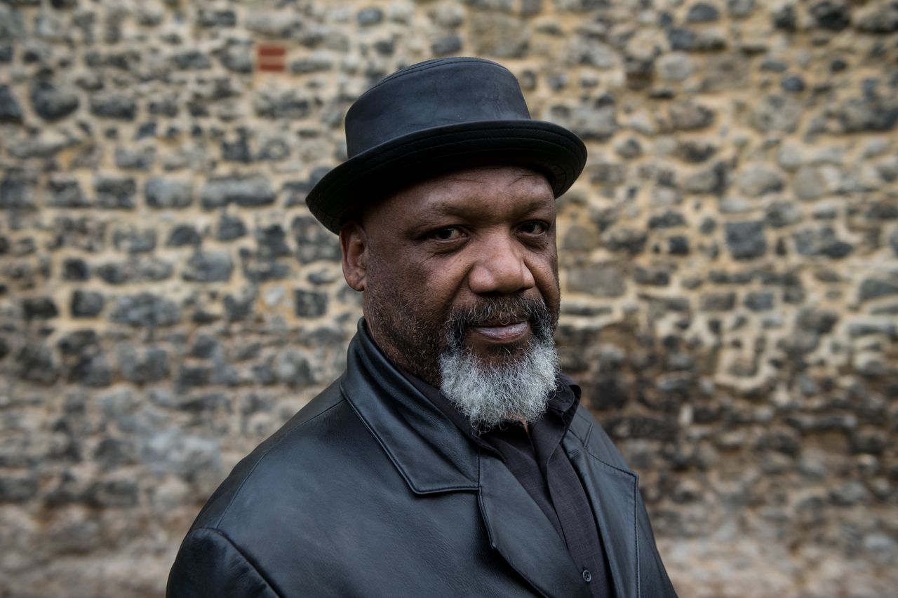 Elwaldo Romeo, 63, poses for a photograph on College Green after members of the Windrush generation and their families attend a meeting with MPs at the House of Commons on May 1, 2018 in London, England.