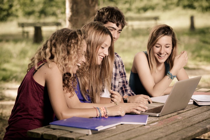 group of teenage students at...