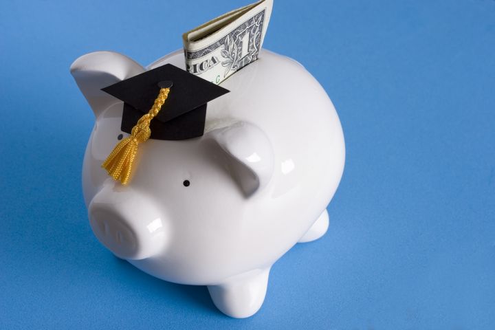 piggy bank with a graduation...