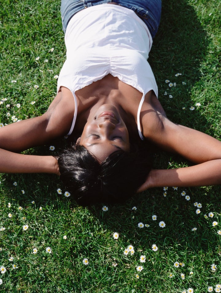 Woman lying on grass - IS535-035