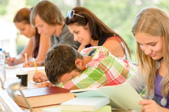 High-school student falling asleep in class teens lesson college bored