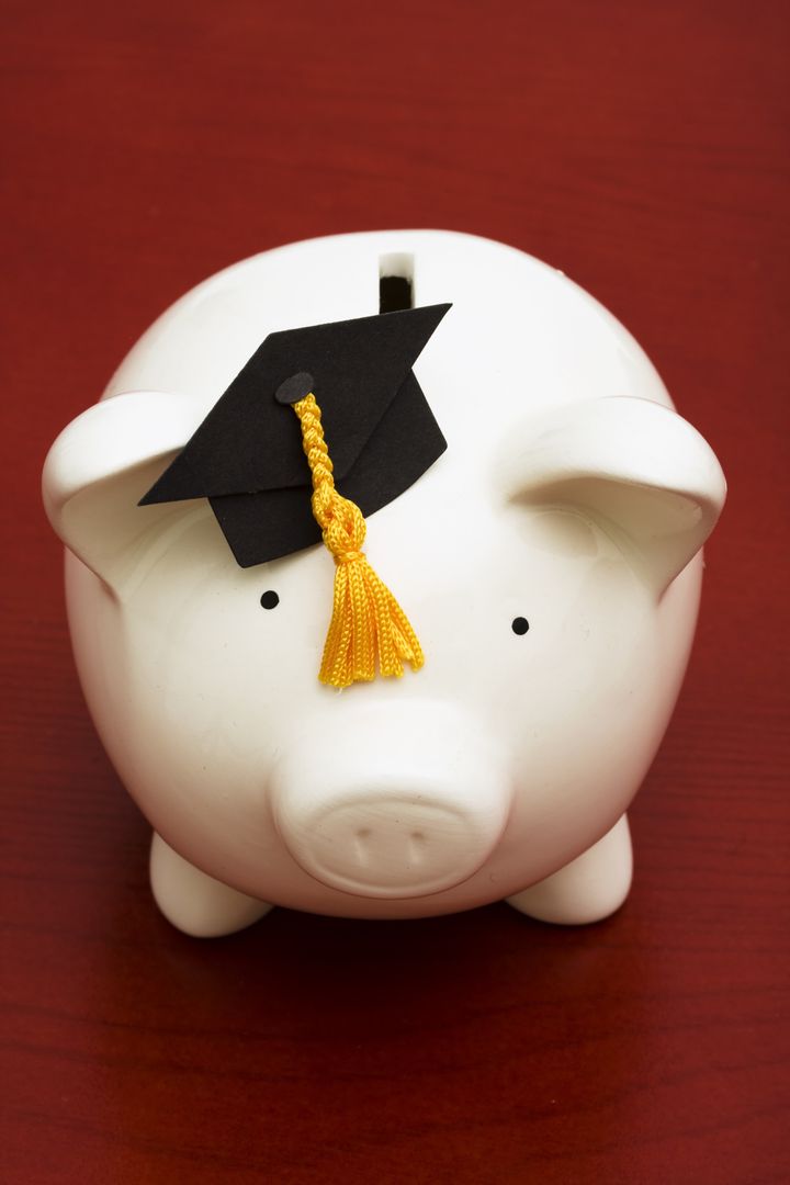 Piggy bank with graduation cap â the cost of education