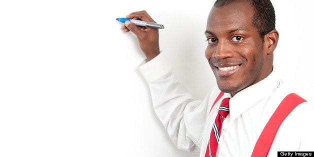 Man at a white board