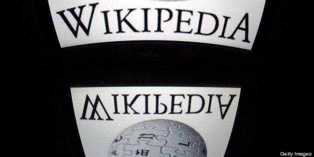 The 'Wikipedia' logo is seen on a tablet screen on December 4, 2012 in Paris. AFP PHOTO / LIONEL BONAVENTURE (Photo credit should read LIONEL BONAVENTURE/AFP/Getty Images)
