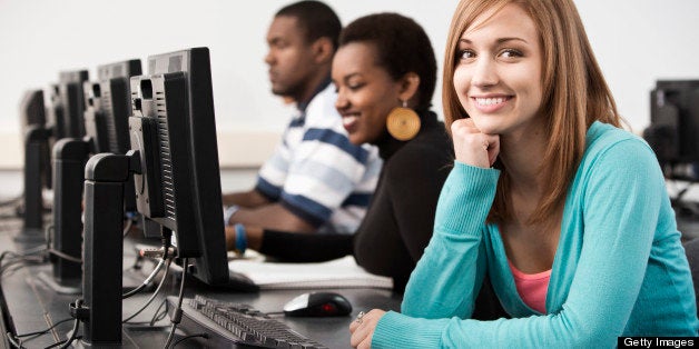 Students sitting together in computer lab