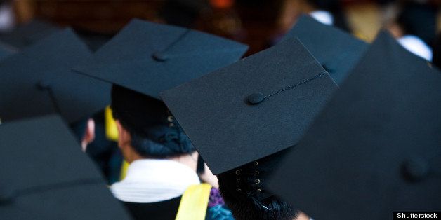 shot of graduation caps during...