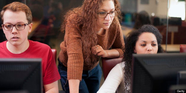 Students working in computer class