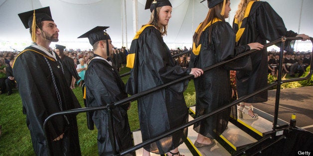 FRAMINGHAM - MAY 19: Graduates lined up to receive their diplomas at Framingham State University's commencement ceremony on May 19, 2013. (Photo by Aram Boghosian for The Boston Globe via Getty Images)