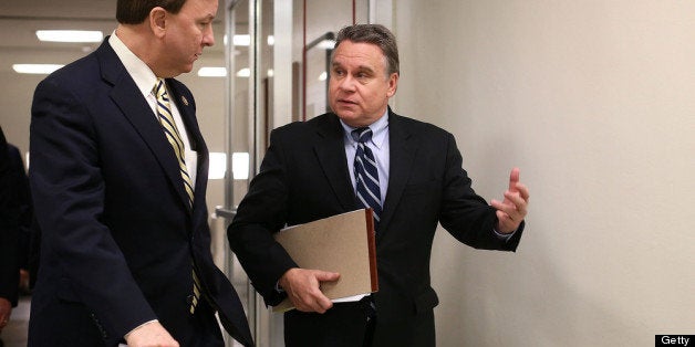 WASHINGTON, DC - JANUARY 15: U.S. Rep. Christopher Smith (R-NJ) (R) talks with Rep. Mike Rogers (R-AL) (L) as they arrive for a vote at the Capitol January 15, 2013 on Capitol Hill in Washington, DC. The House is scheduled to vote on the $50.7 billion Disaster Relief Appropriations for victims of superstorm Sandy later the day. (Photo by Alex Wong/Getty Images)