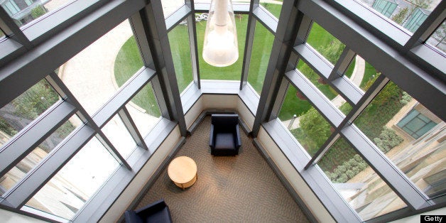 Furniture sits in a lounge on the first level of the faculty offices at the MIT Sloan School of Business Management's new bui