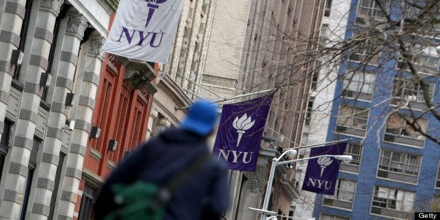 New York University banners hang from a building in New York, U.S., on Monday, April 5, 2010. New York University will face financial hurdles and a fight with Greenwich Village preservationists as it tries to take over more space and compete harder with uptown rival Columbia University. Photographer: Jin Lee/Bloomberg via Getty Images