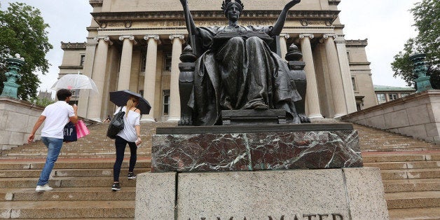 NEW YORK, NY - JULY 01: People walk past the Alma Mater statue on the Columbia University campus on July 1, 2013 in New York City. An interest rate hike kicks in today for student loans, an increase for 7 million students. Congress left town at the end of last week failing to prevent rates on new Stafford student loans increasing from 3.4 percent to 6.8 percent. (Photo by Mario Tama/Getty Images)