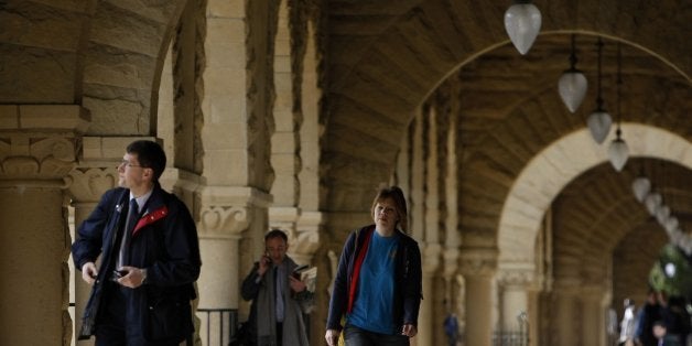 UNITED STATES - FEBRUARY 20: Students walk through an open corridor on the Stanford University campus in Palo Alto, California, U.S., on Wednesday, Feb. 20, 2008. Stanford University raised the most money among academic institution for the third year in a row, aided by a $51 million donation from the estate of a 1927 graduate. (Photo by Erin Lubin/Bloomberg via Getty Images)