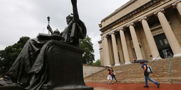 NEW YORK, NY - JULY 01: People walk past the Alma Mater statue on the Columbia University campus on July 1, 2013 in New York City. An interest rate hike kicks in today for student loans, an increase for 7 million students. Congress left town at the end of last week failing to prevent rates on new Stafford student loans increasing from 3.4 percent to 6.8 percent. (Photo by Mario Tama/Getty Images)