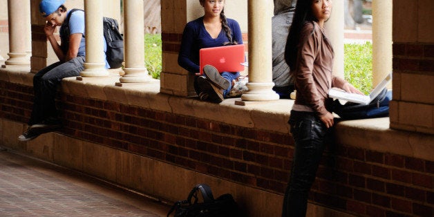 LOS ANGELES, CA - APRIL 23: Students take a break at Royce Hall on the campus of UCLA on April 23, 2012 in Los Angeles, California. According to reports, half of recent college graduates with bachelor's degrees are finding themselves underemployed or jobless. (Photo by Kevork Djansezian/Getty Images)