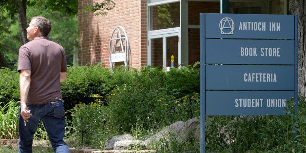 UNITED STATES - JUNE 13: Bruce Soldano, of Hamilton, Ohio, walks past the Antioch Inn, location of the book store, cafeteria and student union, on the campus of Antioch College in Yellow Springs, Ohio, Wednesday, June 13, 2007. Antioch College, the alma mater of civil rights activist Coretta Scott King and 'Twilight Zone' television-series host Rod Serling, will close its doors next year because of declining enrollment and a shortage of money. (Photo by Jay Laprete/Bloomberg via Getty Images)