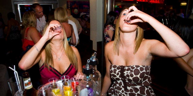 A group of girls drinking. Lineker's Bar, Playa de las Américas. Tenerife, Canary Islands. 2007. (Photo by: PYMCA/UIG via Getty Images)