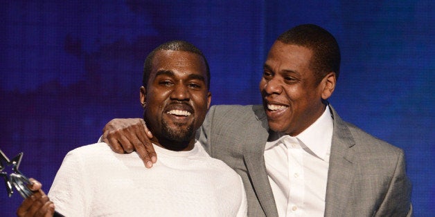 LOS ANGELES, CA - JULY 01: Recording artists Kanye West (L) and Jay-Z accept the Best Group Award onstage during the 2012 BET Awards at The Shrine Auditorium on July 1, 2012 in Los Angeles, California. (Photo by Michael Buckner/Getty Images For BET)