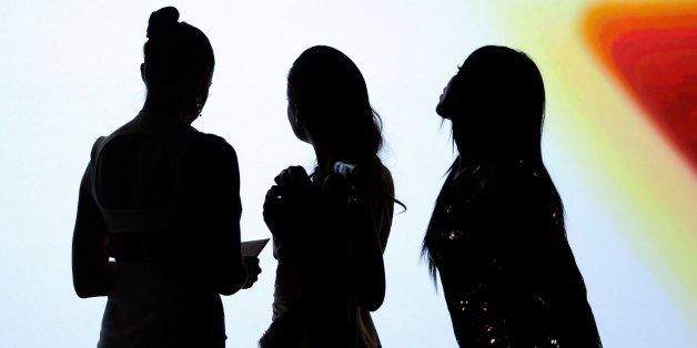 LAS VEGAS, NV - JANUARY 21: (L-R) Adult film actresses Chanel Preston, Allie Haze and Selena Rose are silhouetted onstage as they watch a video clip while presenting awards during the 29th annual Adult Video News Awards Show at The Joint inside the Hard Rock Hotel & Casino January 21, 2012 in Las Vegas, Nevada. (Photo by Ethan Miller/Getty Images)