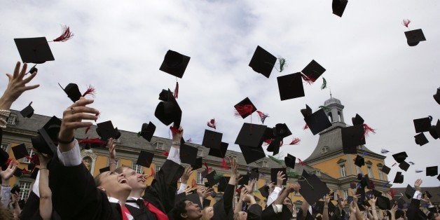 GERMANY - JULY 16: Celebration of the University Bonn: Traditional throwing of the graduate caps in front of the university building. (Photo by Ulrich Baumgarten via Getty Images)