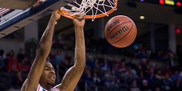 Kansas forward Marcus Morris (22) dunks over Northern Iowa forward Lucas O'Rear (32) in the second round of the NCAA Men's Basketball Tournament at the Ford Center in Oklahoma City, Oklahoma, on Saturday, March 20, 2010. Northern Iowa shocked Kansas, 69-67. (Photo by Shane Keyser/Kansas City Star/MCT via Getty Images)