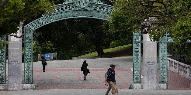 BERKELEY, CA - MAY 22: Pedestrians walk by Sather Gate on the UC Berkeley campus on May 22, 2014 in Berkeley, California. According to the Academic Ranking of World Universities by China's Shanghai Jiao Tong University, Stanford University ranked second behind Harvard University as the top universities in the world. UC Berkeley ranked third. (Photo by Justin Sullivan/Getty Images)