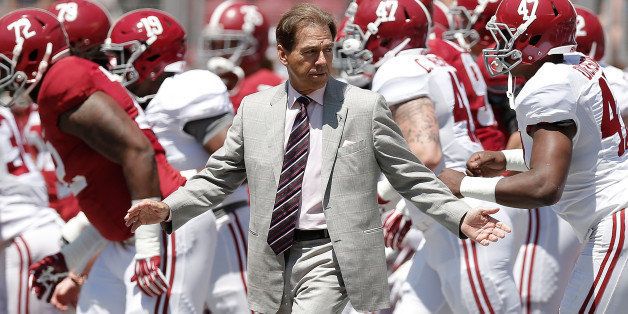 TUSCALOOSA, AL - APRIL 19: Head coach Nick Saban of the Alabama Crimson Tide leads his team onto the field prior to the University of Alabama A-Day spring game at Bryant-Denny Stadium on April 19, 2014 in Tuscaloosa, Alabama. (Photo by Stacy Revere/Getty Images)