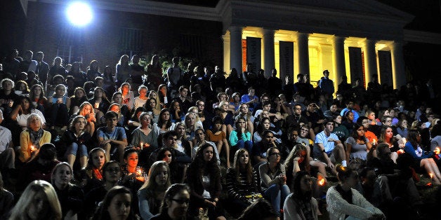 CHARLOTTESVILLE, VA- SEPTEMBER 18: A candlelight vigil attended by hundreds was held tonight at McIntyre Amphitheater (on the UVA campus). The vigil was to honor Hannah Graham who went missing in downtown last Saturday morning. (Photo by Michael S. Williamson/The Washington Post via Getty Images)