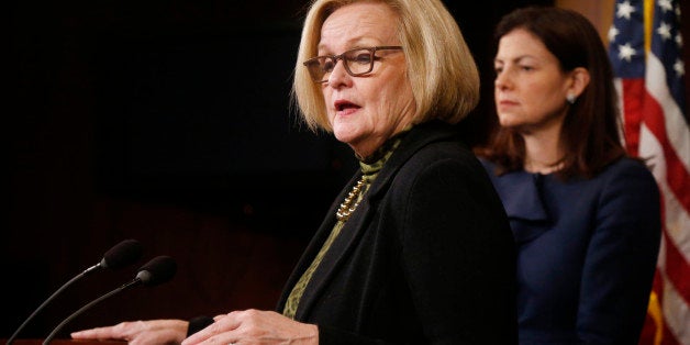 Sen. Claire McCaskill, D-Mo., left, and Sen. Kelly Ayotte, R-N.H., participate in a news conference on Capitol Hill in Washington, Thursday, March 6, 2014, following a Senate vote on military sexual assaults . The Senate blocked a bill that would have stripped senior military commanders of their authority to prosecute rapes and other serious offenses, capping an emotional, nearly yearlong fight over how best to curb sexual assault in the ranks. (AP Photo/Charles Dharapak)