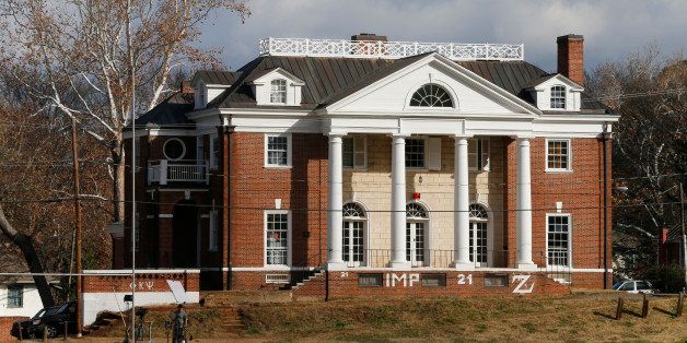 The Phi Kappa Psi fraternity house at the University of Virginia in Charlottesville, Va., Monday, Nov. 24, 2014. A Rolling Stone article last week alleged a gang rape at the house which has since suspended operations. (AP Photo/Steve Helber)