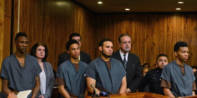 From left, Noah Williams, Jahmel Latimer, Darius Singleton, and Garrett Collick stand before their arraignment in Superior Court in Paterson, N.J. on Tuesday, Dec. 2, 2014. A fifth student, Tremaine Scott, was not present. The five students at New Jersey's William Paterson University pleaded not guilty Tuesday to charges they restrained and sexually assaulted a female student at a dormitory. (AP Photo/The Record of Bergen County, Michael Karas, Pool)