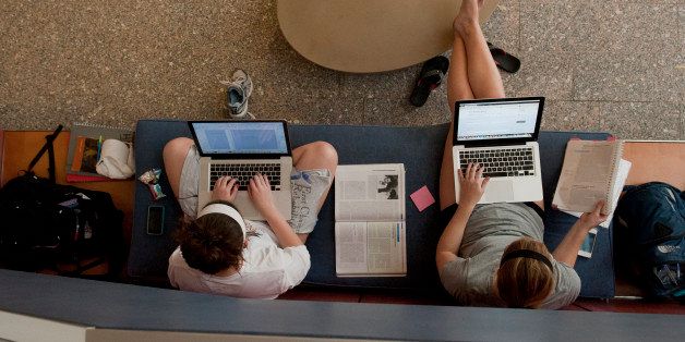 Maura Clark, left, and Cayla Meinert studied for final exams in the lobby of the Chemistry Building on Penn State's University Park campus on May 1. Students at all Penn State campuses are studying for and taking final exams this week.