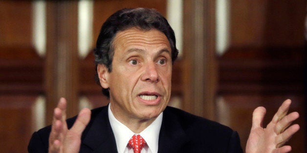 FILE - This June 11, 2013 photo, New York Gov. Andrew Cuomo speaks during a news conference in the Red Room at the Capitol in Albany, N.Y. On Saturday, Jan. 17, 2015 Cuomo said that he will propose legislation that would expand to New York's private colleges the "yes means yes" regulations against sexual assault that have been adopted at the state's own university system. Under the bill, a woman would have to give clear and voluntary consent before sexual activity and students reporting assaults would get immunity from related offenses such as drug use. (AP Photo/Mike Groll, File)