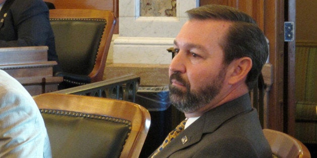 Kansas state Rep. Virgil Peck, a Tyro Republican, listens to speeches on his behalf in the race for House speaker, Monday, Dec. 1, 2014, at the Statehouse in Topeka, Kan. Peck has failed to oust House Speaker Ray Merrick. (AP Photo/John Hanna)