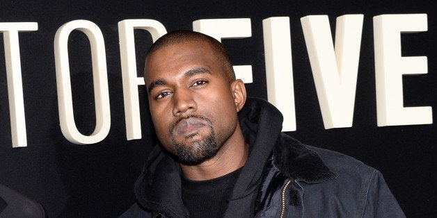 FILE - In this Dec. 3, 2014 file photo, Kanye Wests attend the premiere of "Top Five" at the Ziegfeld Theatre in New York. We
