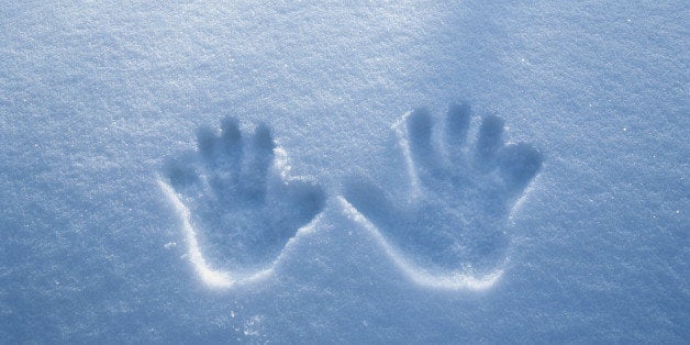 Handprints in fresh snow, winter