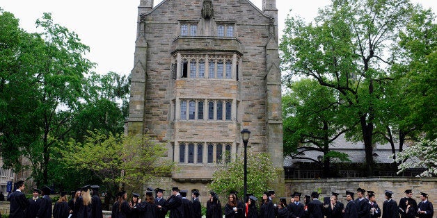 Future graduates line up for commencement on campus of Yale University in New Haven, Conn., Monday, May 20, 2013. (AP Photo/J