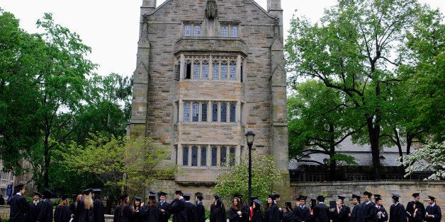 Future graduates line up for commencement on campus of Yale University in New Haven, Conn., Monday, May 20, 2013. (AP Photo/Jessica Hill)