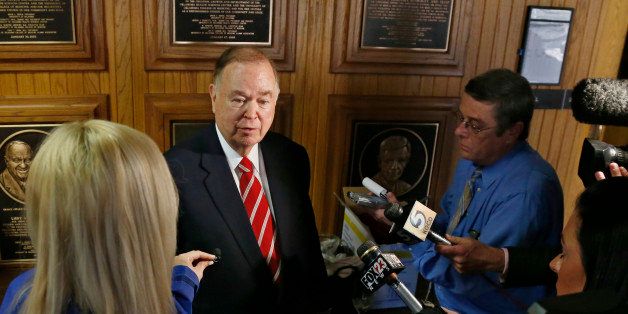 University of Oklahoma President David Boren talks with the media before the start of a Board of Regents meeting in Oklahoma City, Tuesday, March 10, 2015. Two students have been expelled from the University following an incident in which members of a fraternity were caught on video chanting a racial slur. (AP Photo/Sue Ogrocki)
