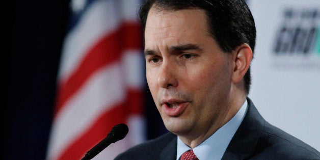 Wisconsin Gov. Scott Walker speaks at the winter meeting of the free market Club for Growth winter economic conference at the Breakers Hotel Saturday, Feb. 28, 2015, in Palm Beach, Fla. (AP Photo/Joe Skipper)