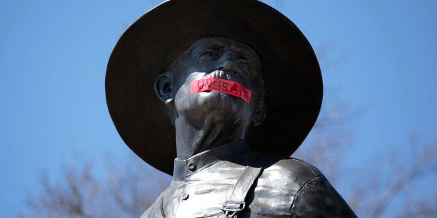 NORMAN, OK- MARCH 11: Tape with the word 'UNHEARD' covers the mouth of the sculpture 'The Sower' at the University of Oklahoma on March 11, 2015 in Norman, Oklahoma. Video showing Sigma Alpha Epsilon members singing a racist chant while traveling on a tour bus went viral after being uploaded to the internet. SAE's national chapter has since suspended the students involved and the University of Oklahoma President David Boren has terminated the fraternity's affiliation with the school. The statue was marked by the black student group OU UNHEARD at the university. (Photo by Brett Deering/Getty Images)