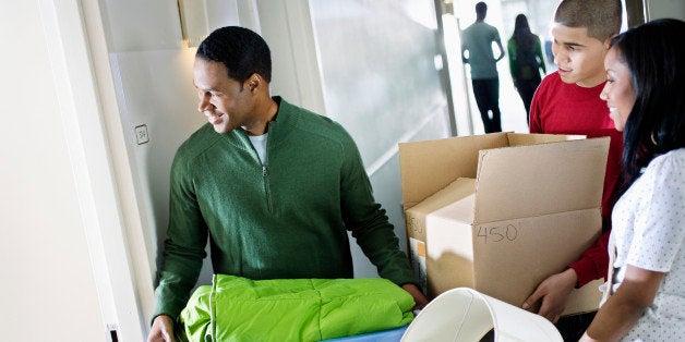 Father Helping Daughter Move into Dormitory