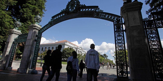 File - In this June 1, 2011 file photo a group of students walk through the Sather Gate on the University of California, Berkeley campus in Berkeley, Calif. More students than ever are applying for undergraduate admission at the University of California. UC officials said Friday Jan. 18, 2013 that the number of students applying to UC's nine undergraduate campuses rose 8.6 percent to 174,767. That includes freshman and transfer applicants applying for fall 2013. The increase was partly driven by a surge of applications from outside California. (AP Photo/Eric Risberg, File)