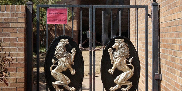 NORMAN, OK- MARCH 11: The front gates are chained at the Sigma Alpha Epsilon fraternity on March 11, 2015 in Norman, Oklaho