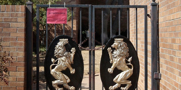 NORMAN, OK- MARCH 11: The front gates are chained at the Sigma Alpha Epsilon fraternity on March 11, 2015 in Norman, Oklahoma. Video showing Sigma Alpha Epsilon members singing a racist chant while traveling on a tour bus went viral after being uploaded to the internet. SAE's national chapter has since suspended the students involved and the University of Oklahoma President David Boren has terminated the fraternity's affiliation with the school. (Photo by Brett Deering/Getty Images)