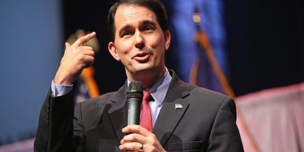 WAUKEE, IA - APRIL 25: Governor Scott Walker of Wisconsin speaks to guests gathered at the Point of Grace Church for the Iowa