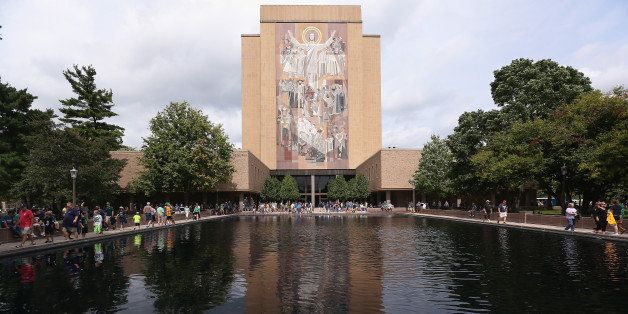 SOUTH BEND, IN - AUGUST 30: The mural at the Hesburgh Library, commonly known as 'Touchdown Jesus' is seen on the campus of Notre Dame University before a game between the Norte Dame Fighting Irish and the Rice Owls at Notre Dame Stadium on August 30, 2014 in South Bend, Indiana. (Photo by Jonathan Daniel/Getty Images)