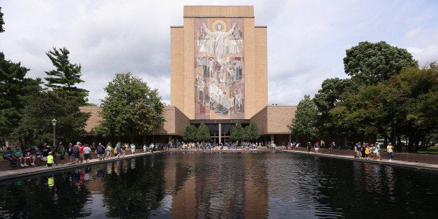 SOUTH BEND, IN - AUGUST 30: The mural at the Hesburgh Library, commonly known as 'Touchdown Jesus' is seen on the campus of Notre Dame University before a game between the Norte Dame Fighting Irish and the Rice Owls at Notre Dame Stadium on August 30, 2014 in South Bend, Indiana. (Photo by Jonathan Daniel/Getty Images)